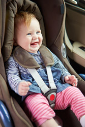 Baby sitting in car seat