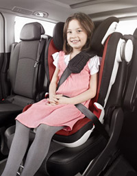 Girl in booster seat